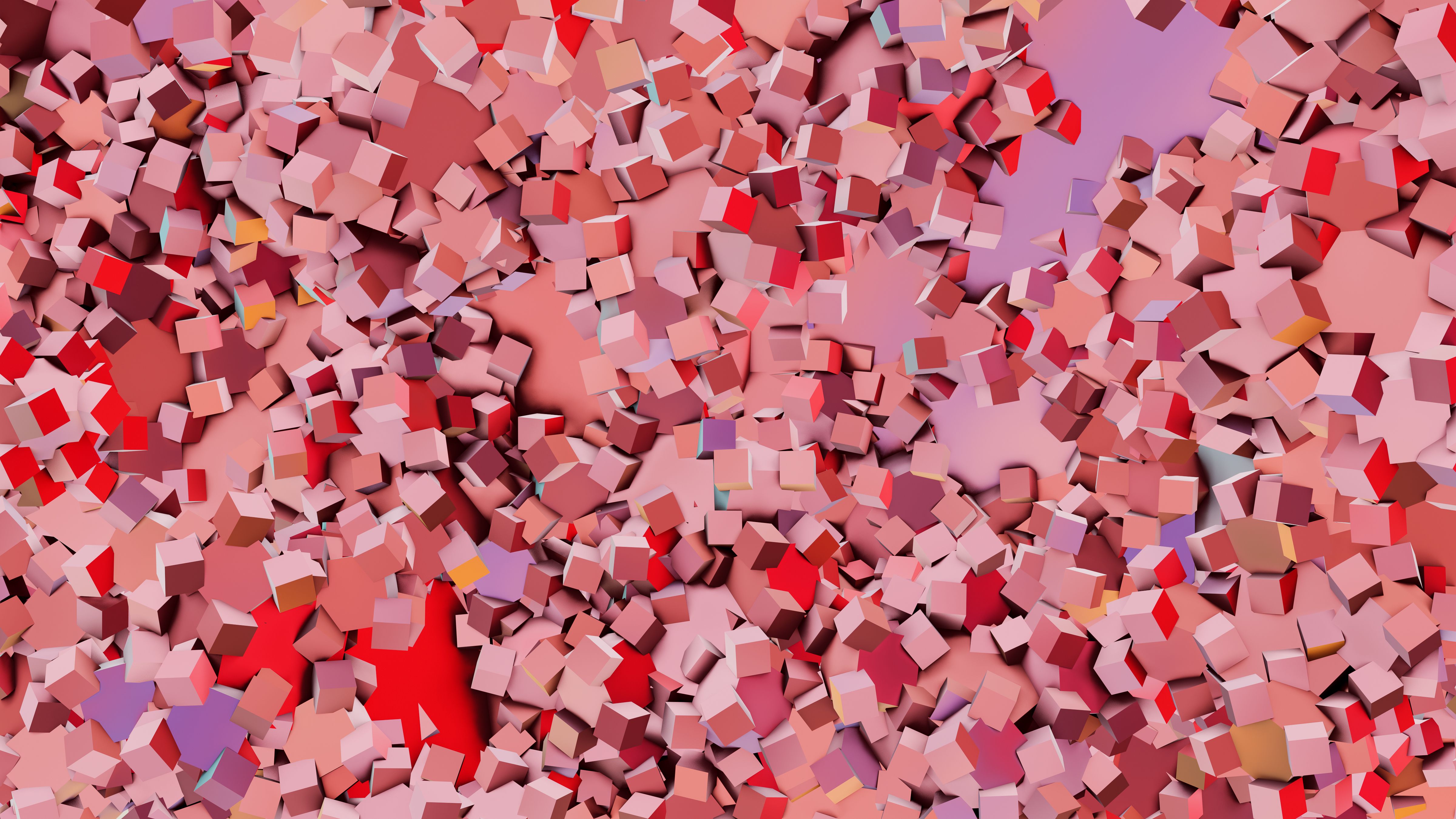 Thousands of small red and pink cubes scattered like confetti.