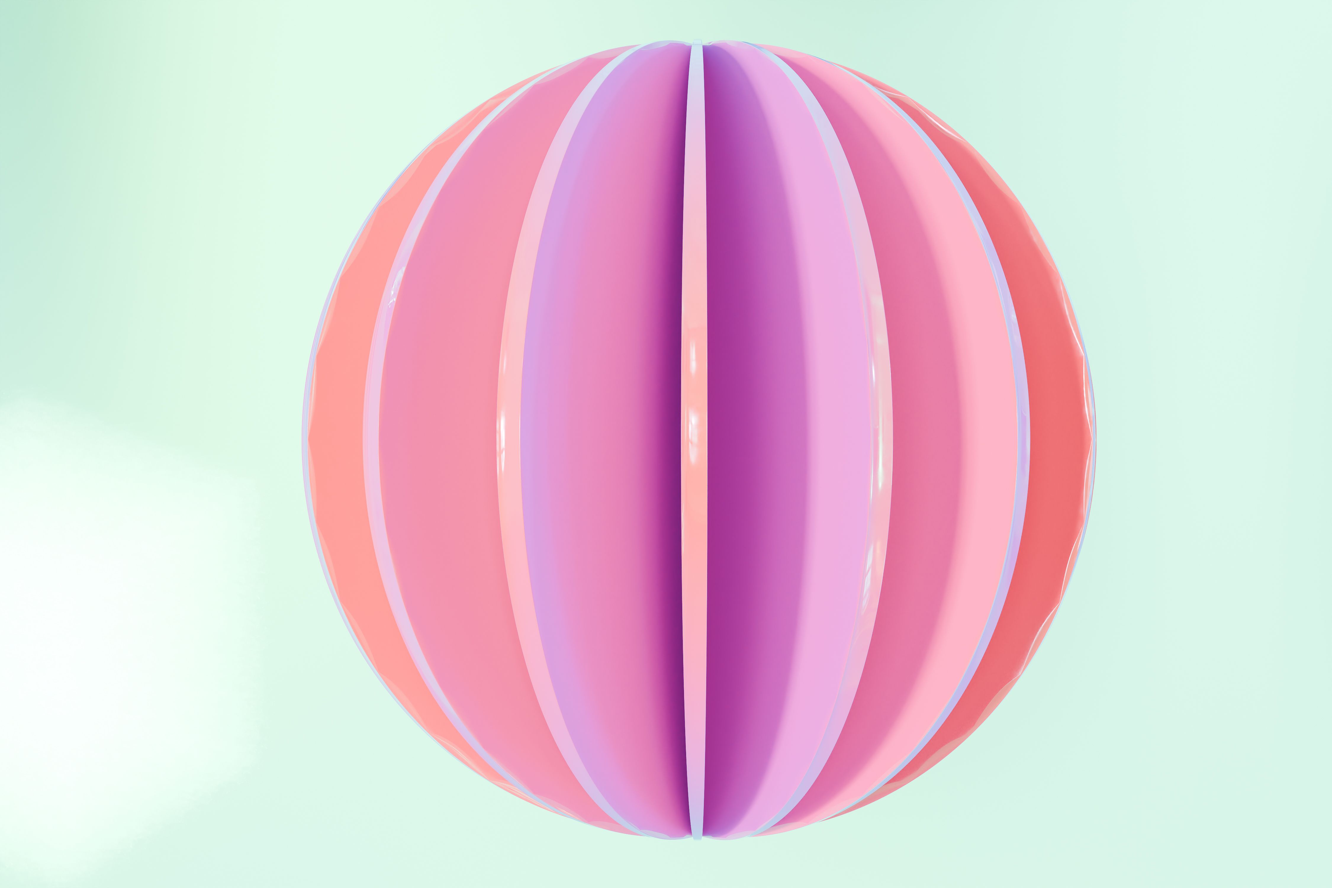 A pastel sphere made of soft overlapping petals on a pale ground.